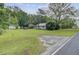 Charming single-story home with a well-maintained lawn, mature trees, and a private driveway at 1050 Mt Zion Rd, Saint George, SC 29477