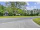 Scenic street view with a charming home, lush greenery, and a peaceful, rural atmosphere at 1050 Mt Zion Rd, Saint George, SC 29477