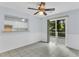 Dining area showcasing tiled floor, wainscotting and sliding glass doors to the patio at 106 Chaff Ct, Summerville, SC 29485