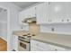 Practical kitchen with an electric range and ample cabinet space at 106 Chaff Ct, Summerville, SC 29485