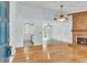 Inviting living room showcasing hardwood floors, a cozy fireplace, and an open floor plan at 106 Chaff Ct, Summerville, SC 29485