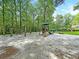 Community playground area with slides, swings, and ample space for children to play at 106 Chaff Ct, Summerville, SC 29485