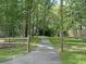 Community walking trail surrounded by trees at 106 Chaff Ct, Summerville, SC 29485