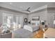 Spacious bedroom featuring light gray walls, shuttered windows, and hardwood flooring at 108 Carolina Blvd, Isle of Palms, SC 29451