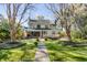 Expansive backyard with a patio, seating, mature trees, and lush landscaping creates a tranquil outdoor living space at 1081 Groves Manor Ct, Mount Pleasant, SC 29464