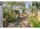 Tranquil backyard featuring a pergola covered in climbing vines and a newly built wooden fence at 1081 Groves Manor Ct, Mount Pleasant, SC 29464