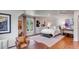 Spacious bedroom with hardwood floors, large windows, and stylish decor at 1081 Groves Manor Ct, Mount Pleasant, SC 29464