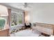 Cozy Bedroom with crib, plush rug, and large window overlooking the backyard at 1081 Groves Manor Ct, Mount Pleasant, SC 29464