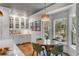 Charming breakfast nook with natural light, stylish chairs, and convenient access to outdoor deck at 1081 Groves Manor Ct, Mount Pleasant, SC 29464