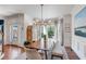 Bright, spacious dining area with ample natural light, modern furniture, and stylish décor, great for entertaining at 1081 Groves Manor Ct, Mount Pleasant, SC 29464