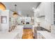 Spacious kitchen features a view to the living room and breakfast nook, with stainless steel appliances at 1081 Groves Manor Ct, Mount Pleasant, SC 29464
