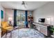 Bright home office with large window, stylish furniture, and hardwood floors at 1081 Groves Manor Ct, Mount Pleasant, SC 29464