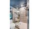 Updated shower with glass door, modern tile, and built-in bench at 1081 Groves Manor Ct, Mount Pleasant, SC 29464