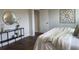 Bright bedroom with a round mirror, modern decor, and a comfortable bed at 109 Crosscut Ln, Summerville, SC 29486