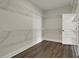 Walk-in closet featuring wire shelving and hardwood flooring at 109 Crosscut Ln, Summerville, SC 29486
