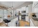 Bright kitchen features granite counters, stainless steel appliances, and ample cabinet space at 1135 Shoreham Rd, Charleston, SC 29412