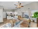 Cozy living room featuring bright open space with a modern kitchen and comfortable seating area at 1135 Shoreham Rd, Charleston, SC 29412