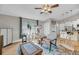 Inviting living room with natural light, stylish decor, and comfortable seating area with wood floor at 1135 Shoreham Rd, Charleston, SC 29412