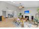 Spacious living room with a fireplace, comfortable seating, and an adjacent office space, with wood floors at 1135 Shoreham Rd, Charleston, SC 29412