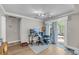 Well-lit home office with dual monitors, comfortable seating and direct access to an outdoor patio at 1135 Shoreham Rd, Charleston, SC 29412