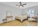 Bright bedroom with ceiling fan, desk, and comfortable seating at 115 Ridge Rd, Summerville, SC 29485