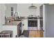 Modern kitchen with stainless steel appliances, granite countertops, and a sleek stainless range hood at 115 Ridge Rd, Summerville, SC 29485