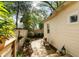 Charming backyard deck with various seating options, and wood perimeter fencing at 116 Magnolia Ave, Charleston, SC 29403