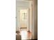 Bright foyer features a wood floor and glass paneled entry door at 116 Magnolia Ave, Charleston, SC 29403