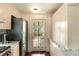 Updated kitchen featuring new stainless steel refrigerator and plenty of storage at 116 Magnolia Ave, Charleston, SC 29403