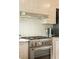 Updated kitchen featuring new stainless steel oven and range, plus updated fixtures at 116 Magnolia Ave, Charleston, SC 29403