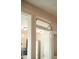 Detailed shot of an open transom window connecting the kitchen to the dining room at 116 Magnolia Ave, Charleston, SC 29403