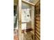 Private outdoor shower with wooden enclosure, perfect for rinsing off after the beach at 116 Magnolia Ave, Charleston, SC 29403