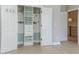 Walk-in closet with custom shelving, drawers, and hanging space at 117 Lucia St, Charleston, SC 29492