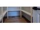 Walk-in pantry with custom shelving for ample storage, door to right at 117 Lucia St, Charleston, SC 29492