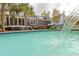 Backyard pool with water feature and beautiful landscaping at 117 Lucia St, Charleston, SC 29492