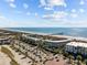 Stunning aerial view of oceanfront condos with private beach access and ample parking at 1300 Ocean Blvd # 308, Isle of Palms, SC 29451