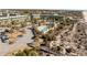Inviting aerial view of condos with a pool, parking, and scenic surroundings at 1300 Ocean Blvd # 308, Isle of Palms, SC 29451