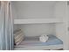 Comfortable bunk room with fresh bedding, offering a cozy retreat for restful nights at 1300 Ocean Blvd # 308, Isle of Palms, SC 29451