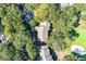 Aerial view of a townhome complex surrounded by lush trees and a golf course at 1365 Dunlin Court, Share D, Kiawah Island, SC 29455