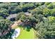Aerial view of townhomes nestled among lush trees next to the golf course at 1365 Dunlin Court, Share D, Kiawah Island, SC 29455