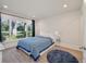 Bright bedroom with large sunny window and hard floors and plush rug at 1365 Dunlin Court, Share D, Kiawah Island, SC 29455