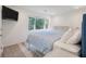 Bright bedroom featuring a plush bed with a blue patterned coverlet and a window with a view at 1365 Dunlin Court, Share D, Kiawah Island, SC 29455