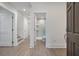 Open entryway leading to a modern bathroom with a glass shower and stylish fixtures at 1365 Dunlin Court, Share D, Kiawah Island, SC 29455