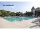 A luxurious outdoor pool with lounge chairs and umbrellas offers a relaxing retreat at 1365 Dunlin Court, Share D, Kiawah Island, SC 29455