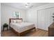 Comfortable bedroom with a ceiling fan, large closet, and natural light at 1366 W Point Dr, Mount Pleasant, SC 29466