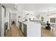 Bright, open kitchen featuring a large island, modern finishes, and hardwood floors at 1366 W Point Dr, Mount Pleasant, SC 29466