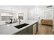 Bright kitchen featuring a quartz countertop island with stainless steel appliances at 1366 W Point Dr, Mount Pleasant, SC 29466