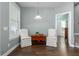 A sunlit dining area with comfortable seating, perfect for enjoying meals and creating memories with Gathering at 1417 Roustabout Way, Charleston, SC 29414