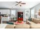Bright and airy living space with modern finishes, an entertainment center, and a cohesive kitchen and living design at 1417 Roustabout Way, Charleston, SC 29414