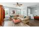 Cozy living room with a plush sofa, decorative rug, and plenty of natural light, creating a comfortable space at 1417 Roustabout Way, Charleston, SC 29414